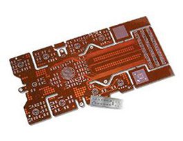 A red pcb with many different types of printed circuit boards.